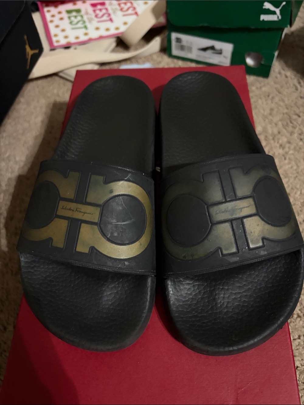 Salvatore Ferragamo Black Slides with Gold Gancini Accent